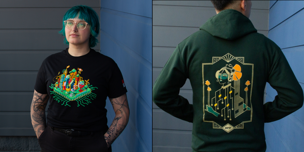 Person wearing a black shirt with the EFF35 Cityscape design next to a person wearing a green and gold Motherboard hoodie.